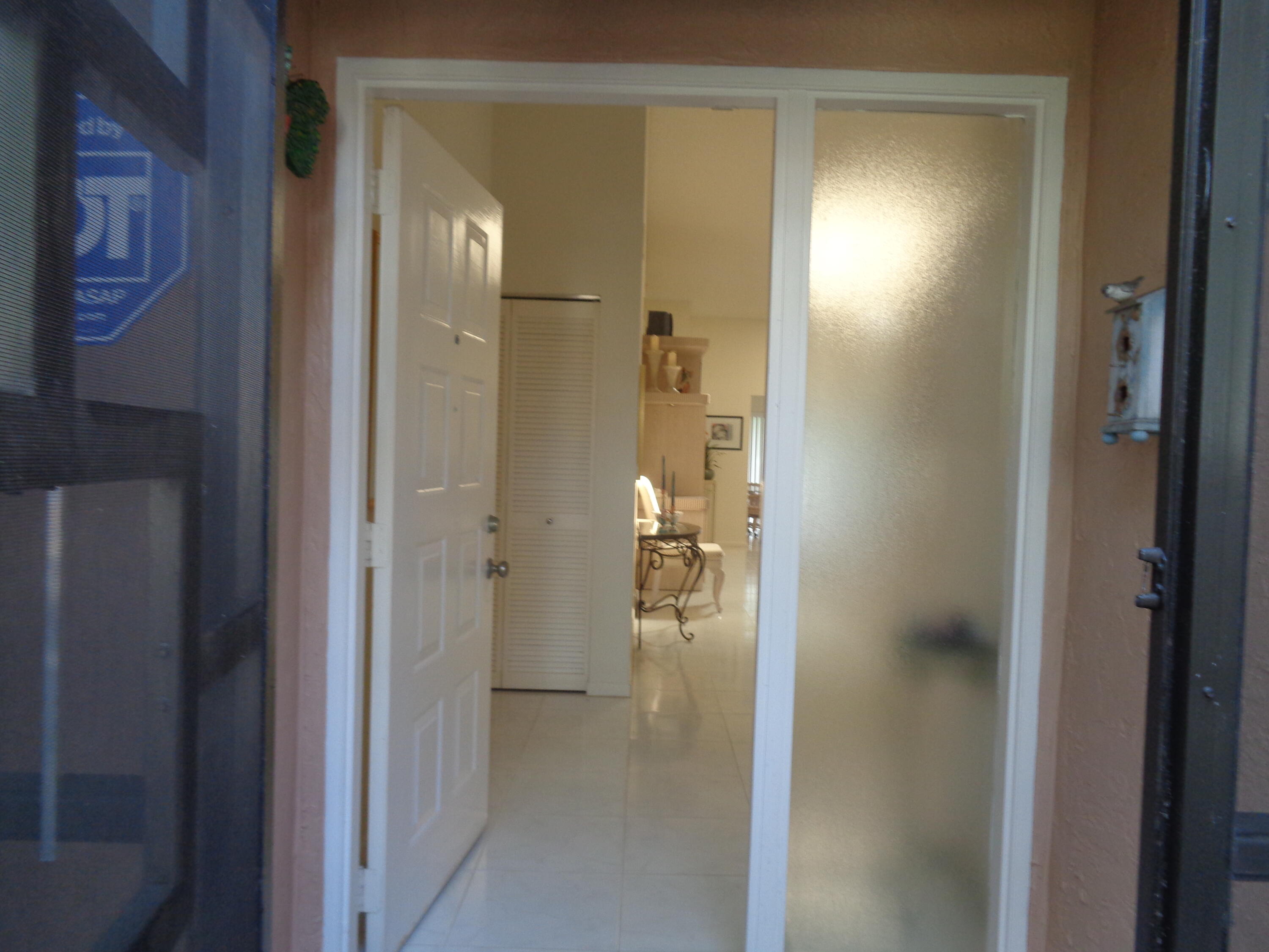 8159 Springlake Drive, Unit A Boca Raton, FL 33496 - Photo 3 of 44 Screened Entry