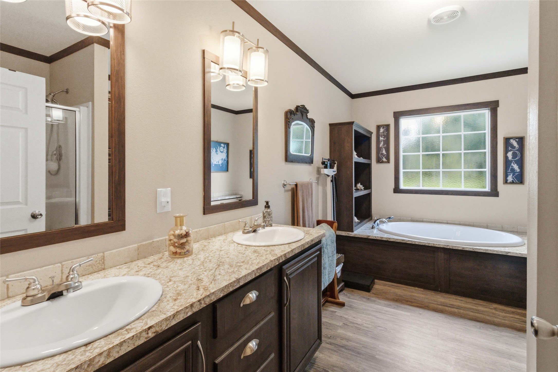 7921 Vista Ranch Road Smithville, TX 78957 - Photo 22 of 39 Double vanity and a soaking tub create a private spa-like retreat.