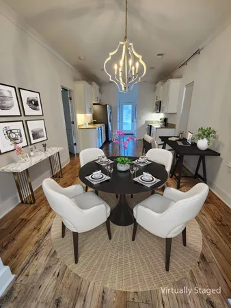a view of a dining room with furniture