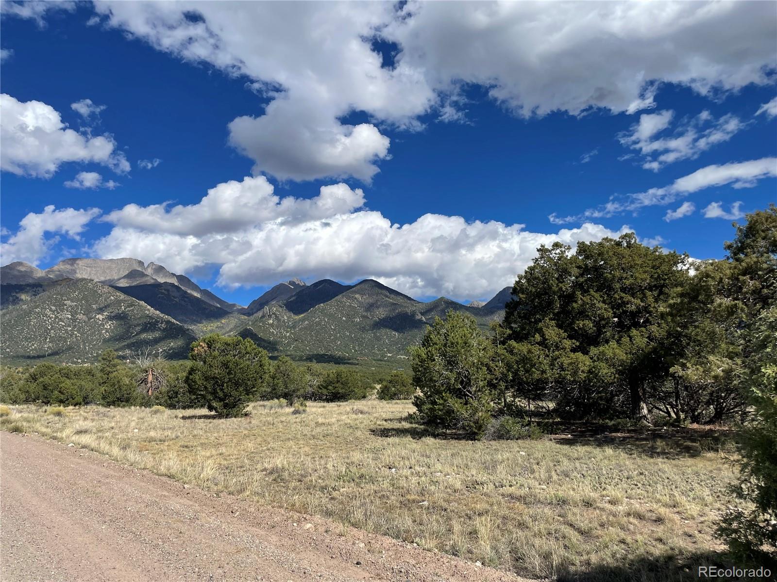 10 Brook Trout Road Crestone, CO 81131 - Photo 1 of 12 a view of a yard with wooden fence