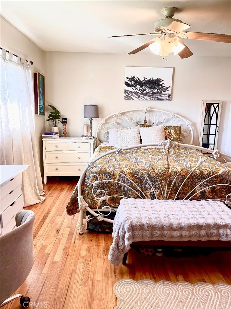 1640 Celeste Court Merced, CA 95341 - Photo 13 of 19 a bedroom with a bed and a chandelier