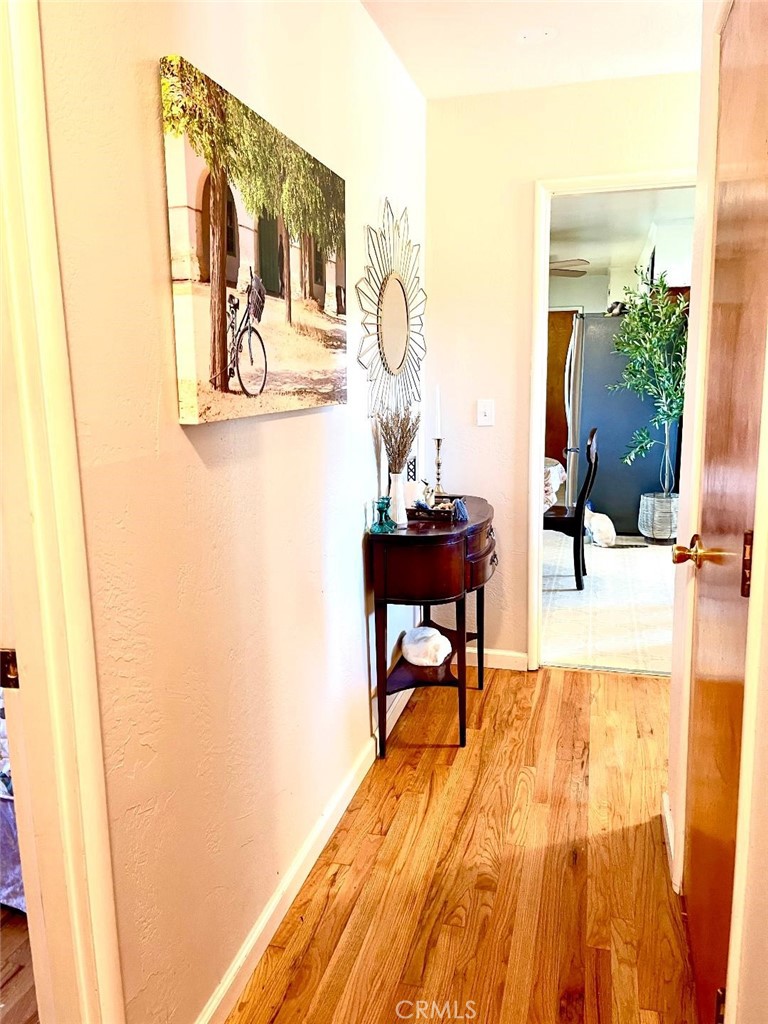 1640 Celeste Court Merced, CA 95341 - Photo 16 of 19 a view of a room with wooden floor and furniture