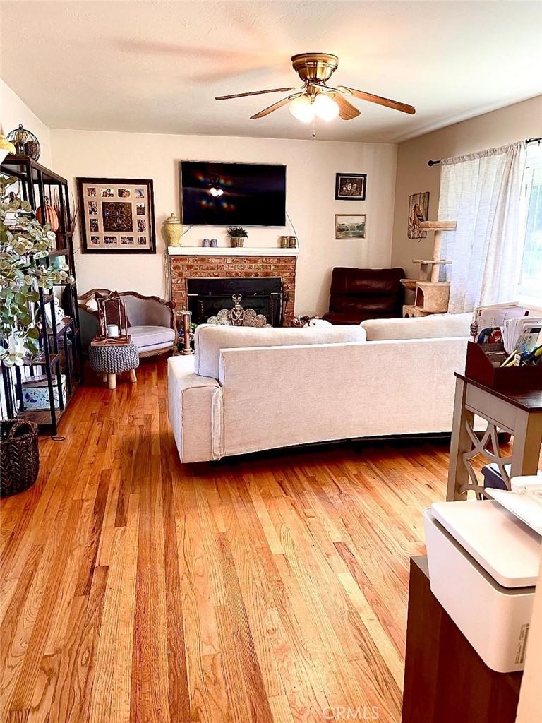 1640 Celeste Court Merced, CA 95341 - Photo 3 of 19 a living room with furniture and a flat screen tv