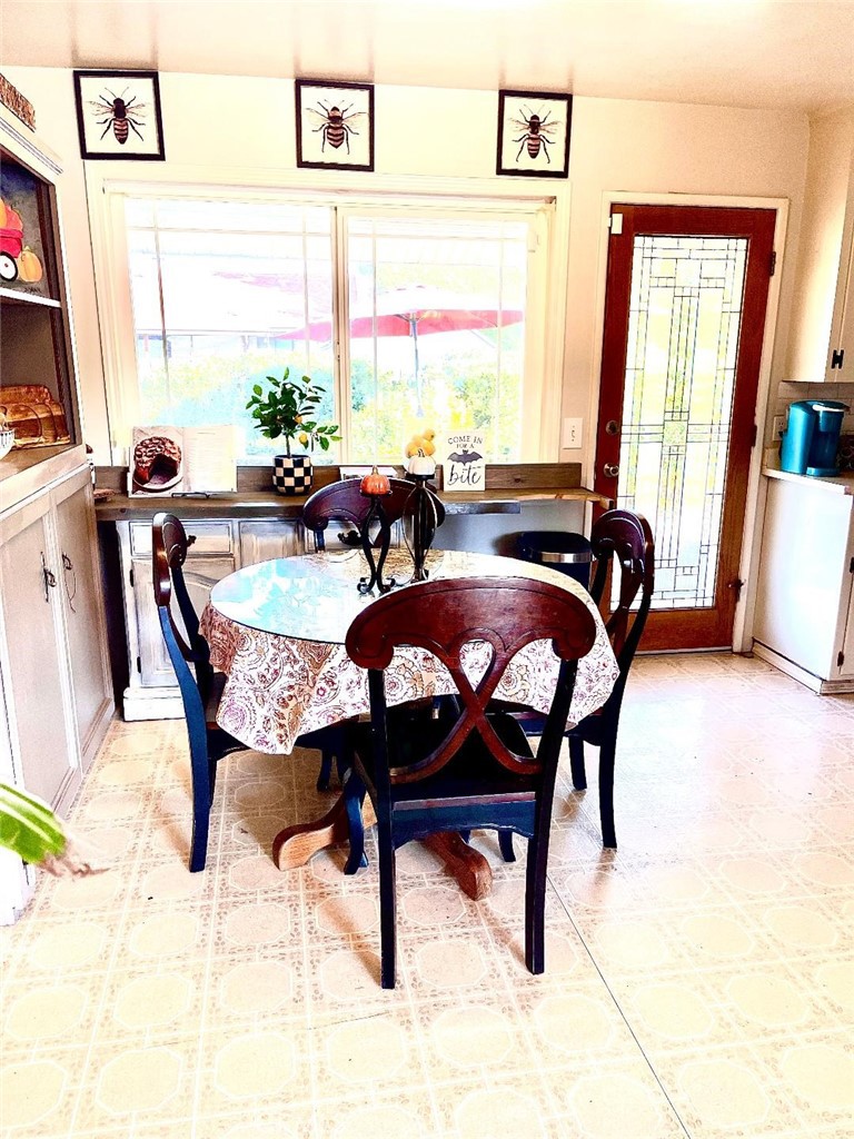 1640 Celeste Court Merced, CA 95341 - Photo 6 of 19 a view of a dining room with furniture and a window