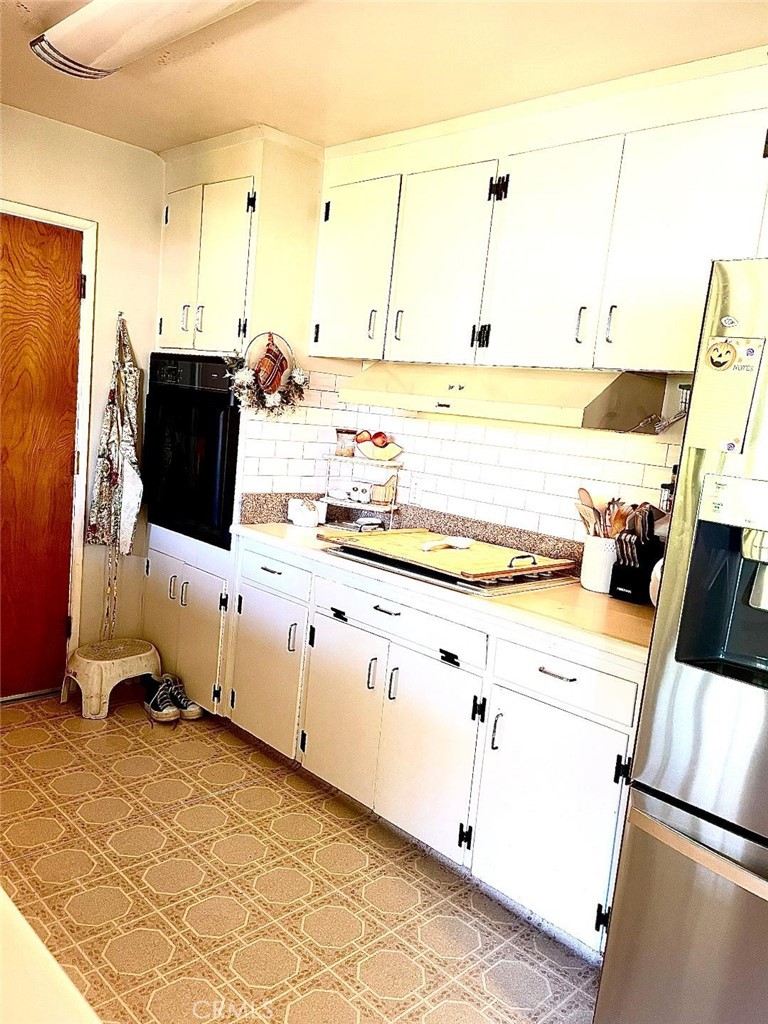 1640 Celeste Court Merced, CA 95341 - Photo 9 of 19 a kitchen with a sink and cabinets