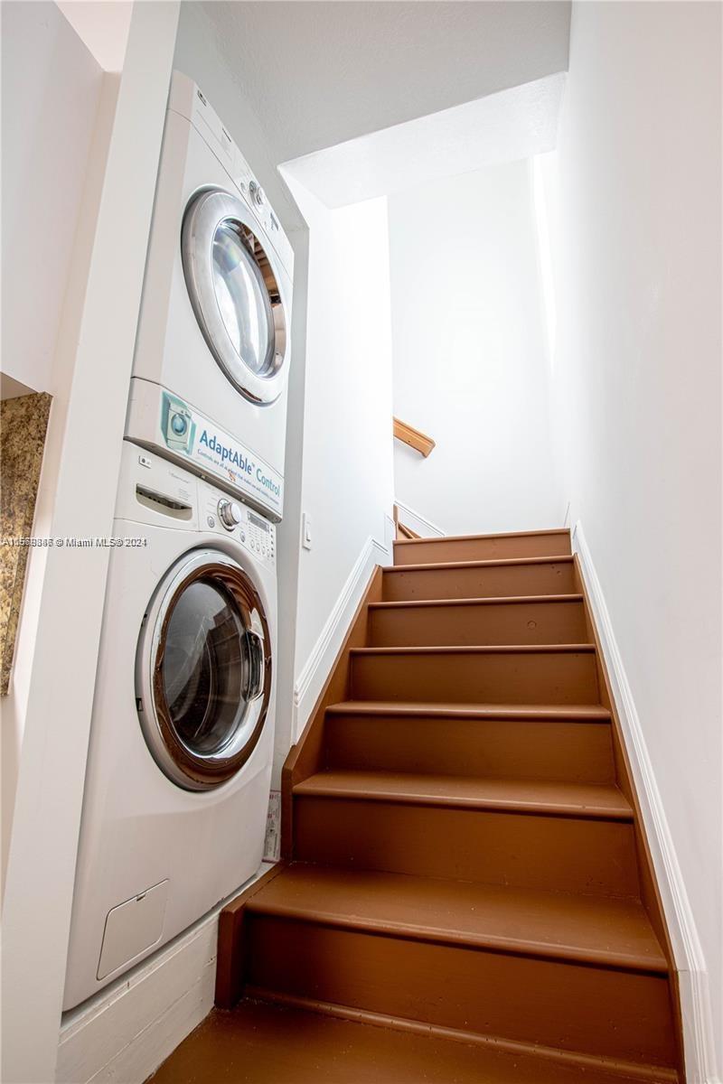 16227 Southwest 139th Court, Unit 2 Miami, FL 33177 - Photo 2 of 9 a utility room with dryer and washer