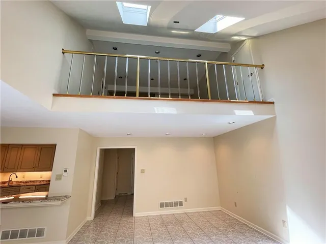 an empty room with windows