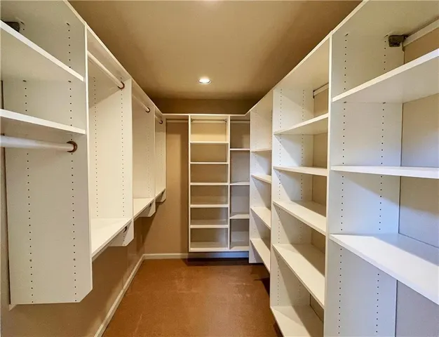 a bathroom with a glass door shower