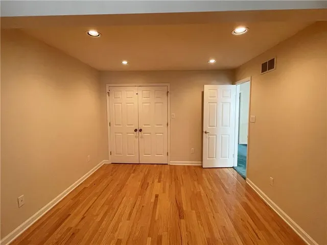 an empty room with windows