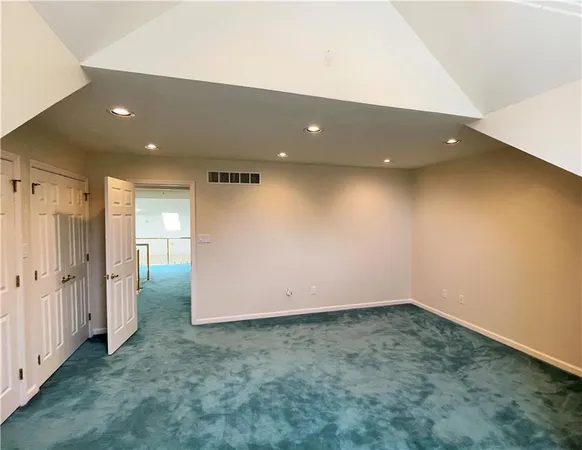 a kitchen with a white cabinets and white appliances