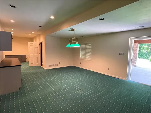 a view of a room with racks on the wall
