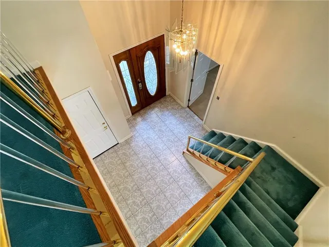 a kitchen with a stove sink and cabinets