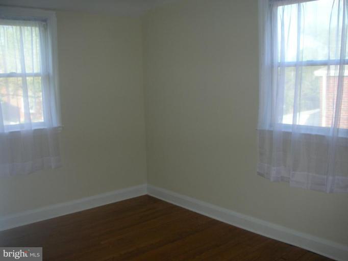 1608 Aberdeen Road Towson, MD 21286 - Photo 18 of 23 an empty room with a window