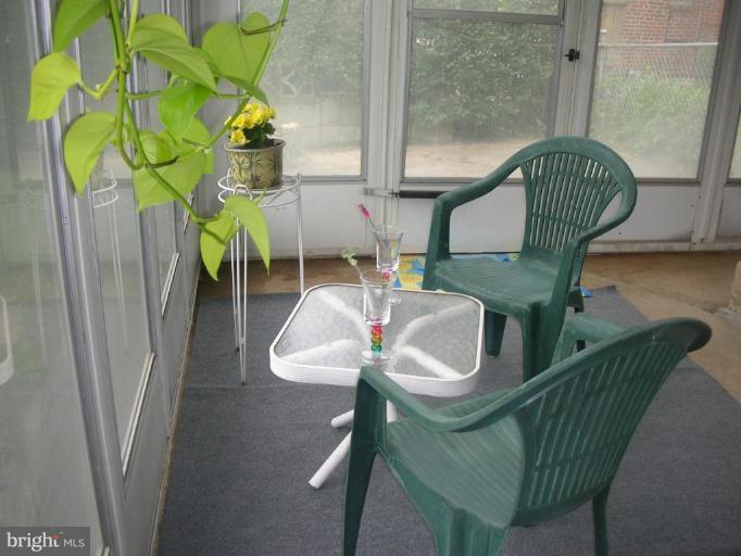 1608 Aberdeen Road Towson, MD 21286 - Photo 19 of 23 a balcony with table and chairs