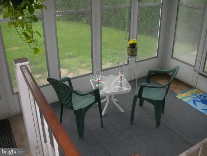 1608 Aberdeen Road Towson, MD 21286 - Photo 20 of 23 a view of a dining room with furniture window and outside view