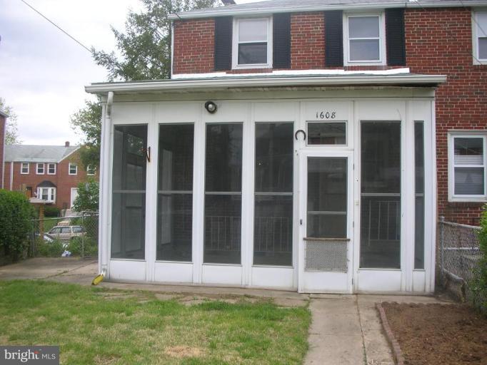 1608 Aberdeen Road Towson, MD 21286 - Photo 8 of 23 a view of a brick house with a large windows