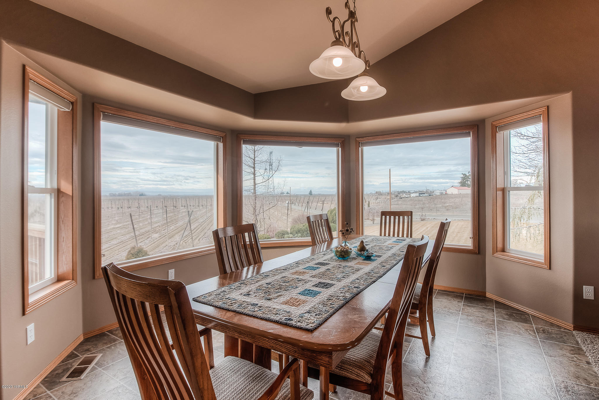 630 Belma Road Grandview, WA 98930 - Photo 12 of 71 a view of a dining room with furniture window and outside view