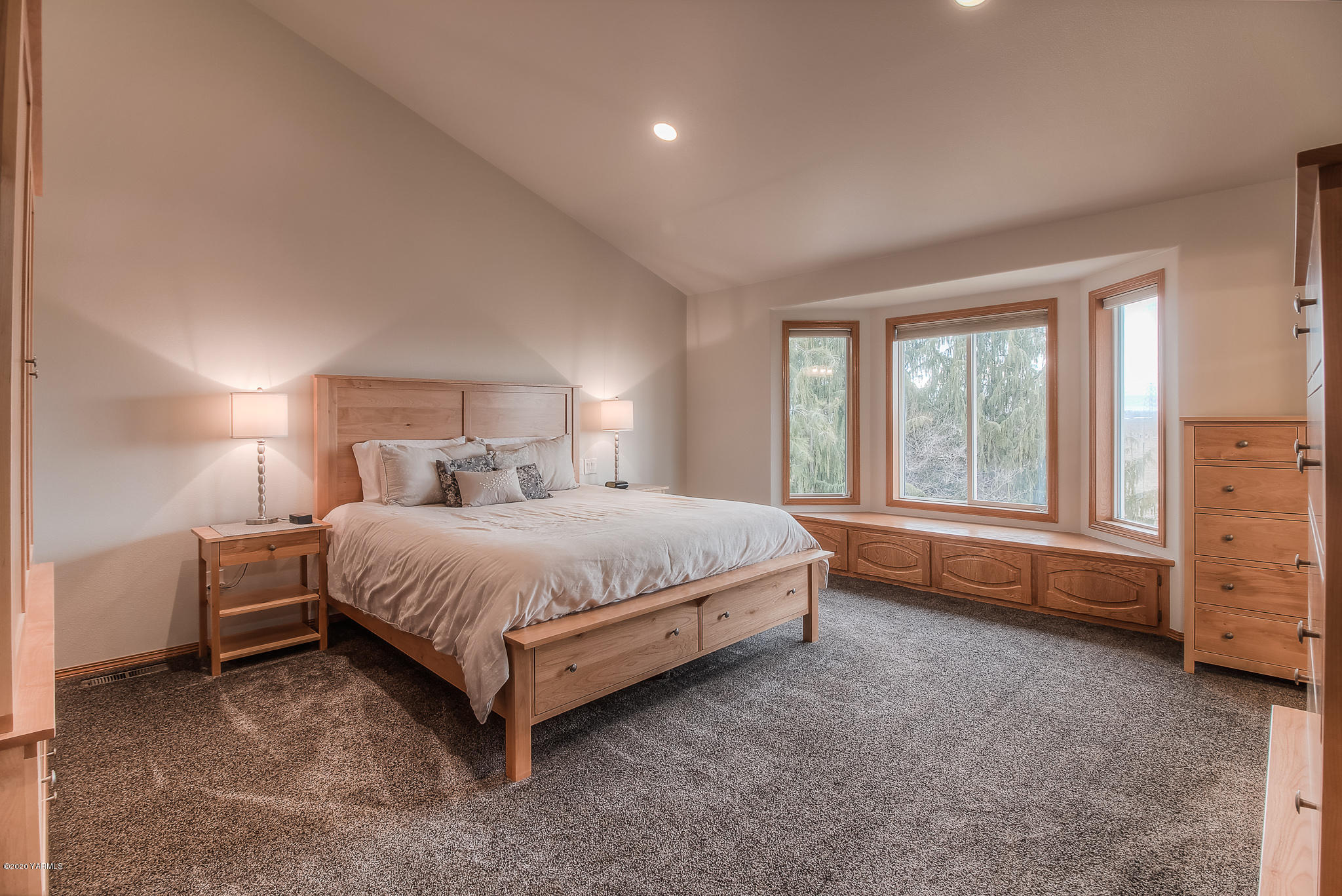 630 Belma Road Grandview, WA 98930 - Photo 21 of 71 a bedroom with a bed and dresser