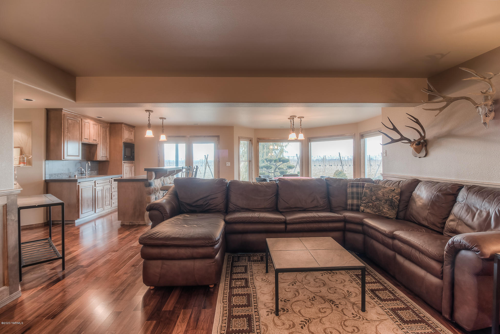 630 Belma Road Grandview, WA 98930 - Photo 38 of 71 a living room with furniture and wooden floor