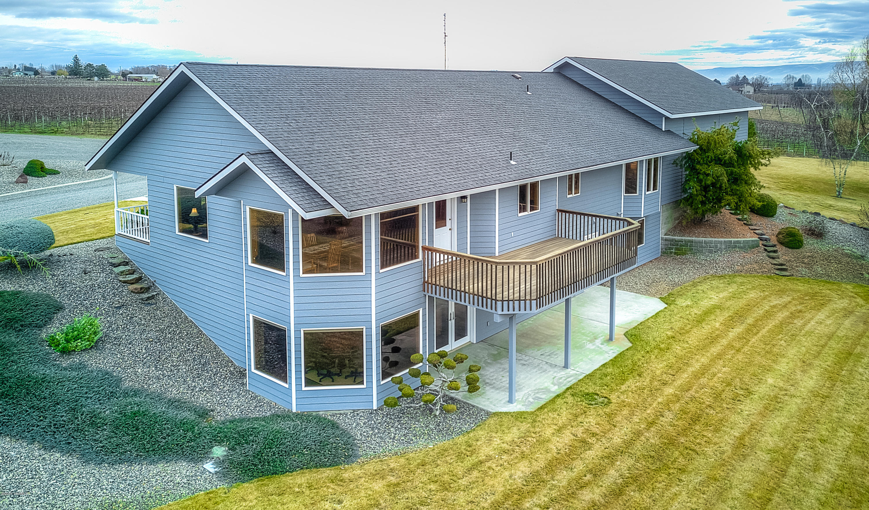 630 Belma Road Grandview, WA 98930 - Photo 48 of 71 a aerial view of a house with swimming pool and porch