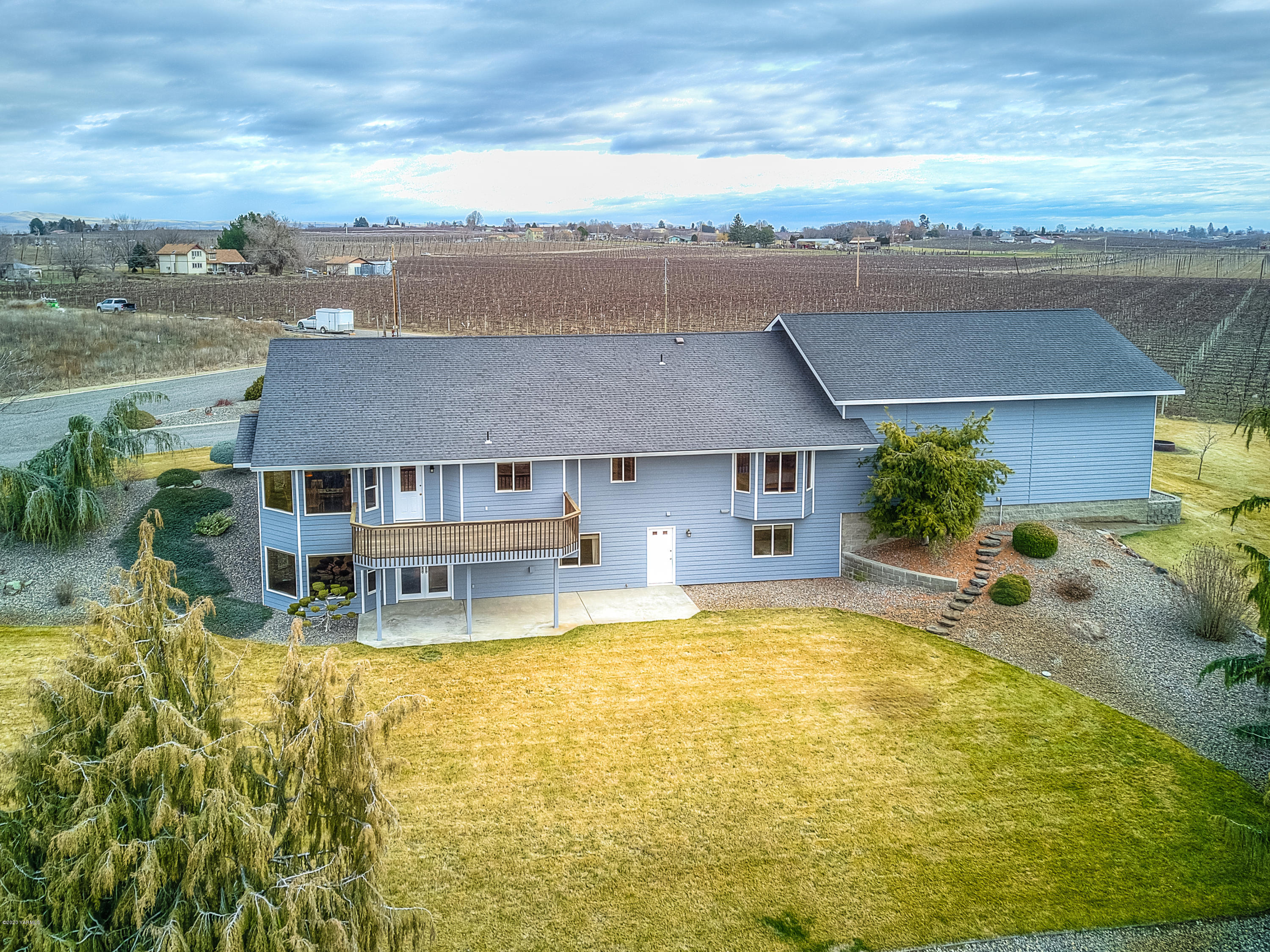 630 Belma Road Grandview, WA 98930 - Photo 49 of 71 an aerial view of house with yard and ocean view