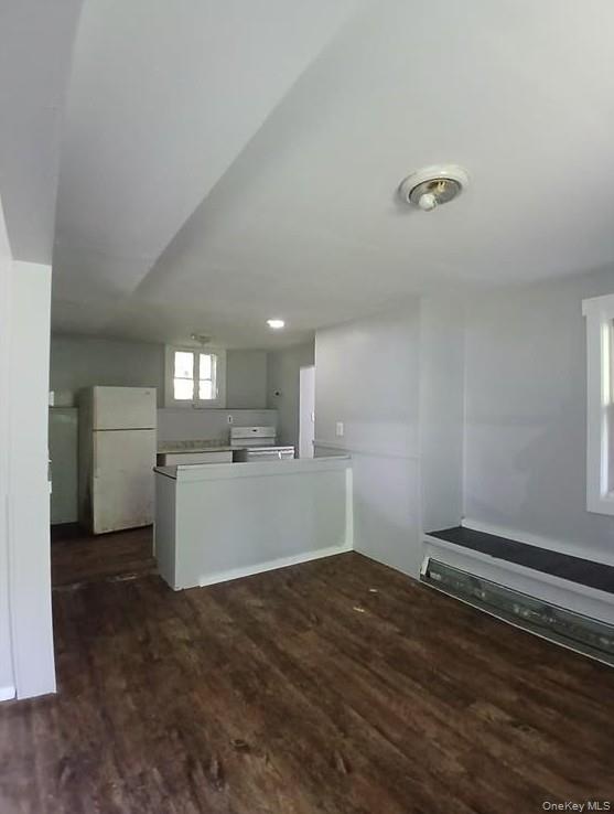 299 South Main Street, Unit #4 Liberty, NY 12754 - Photo 3 of 7 wooden floor in kitchen and an empty room