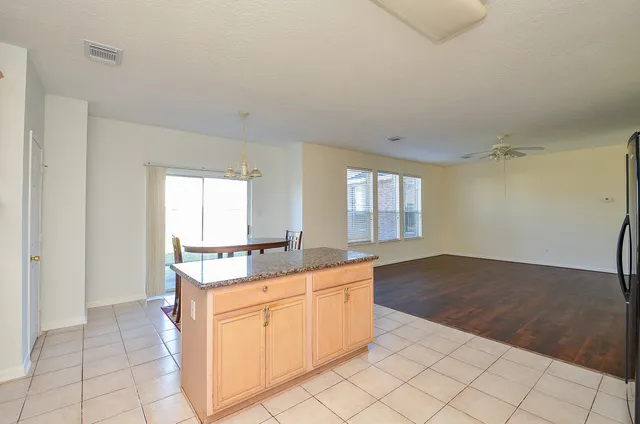 a view of a kitchen with a sink