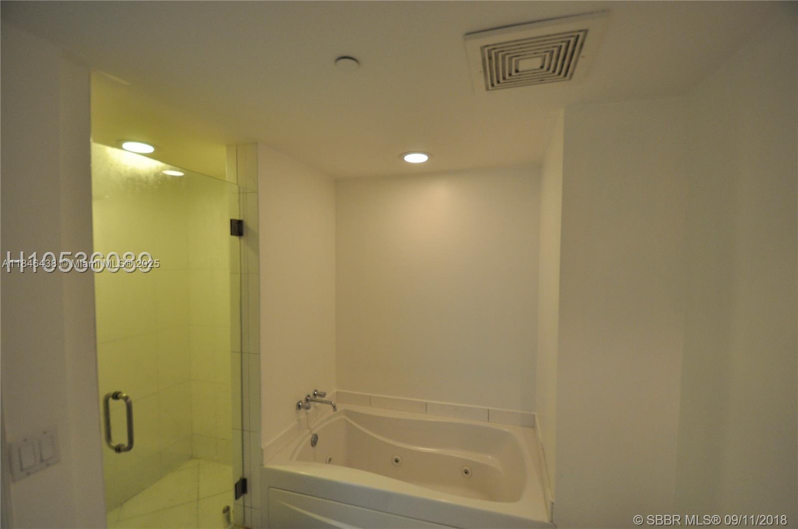 500 Brickell Avenue, Unit 2204 Miami, FL 33131 - Photo 19 of 19 a bathroom with a shower