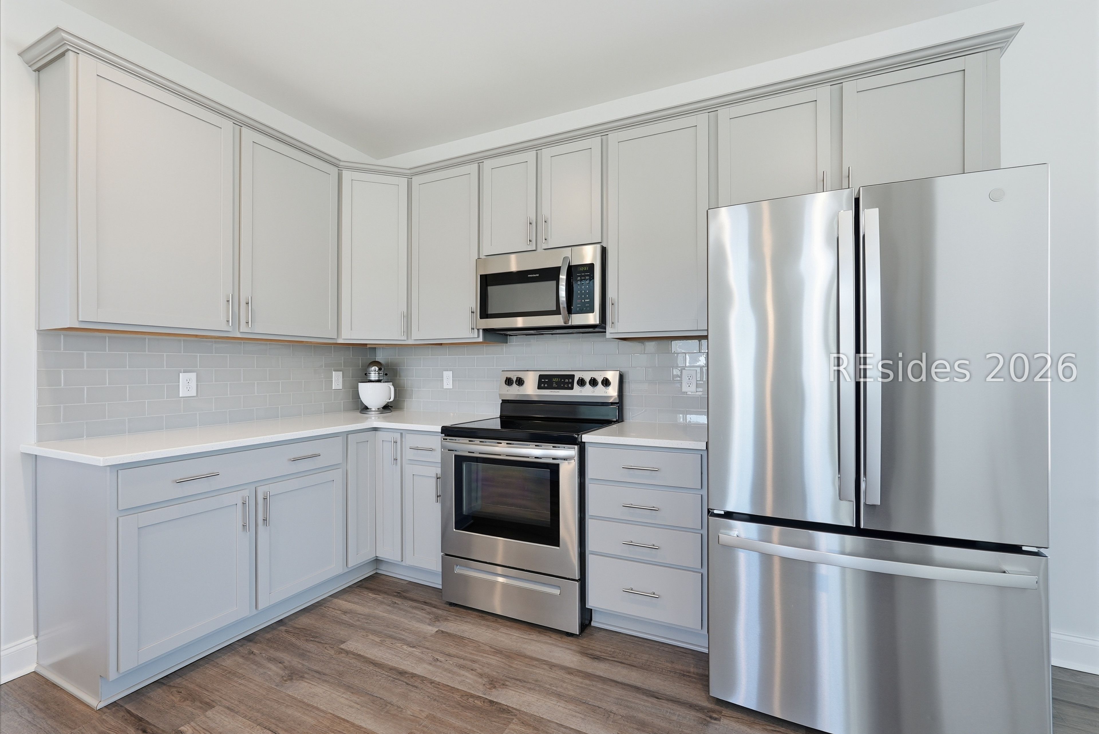 284 Sergeant Jasper Circle Ridgeland, SC 29936 - Photo 13 of 51 Kitchen with tiled backsplash
