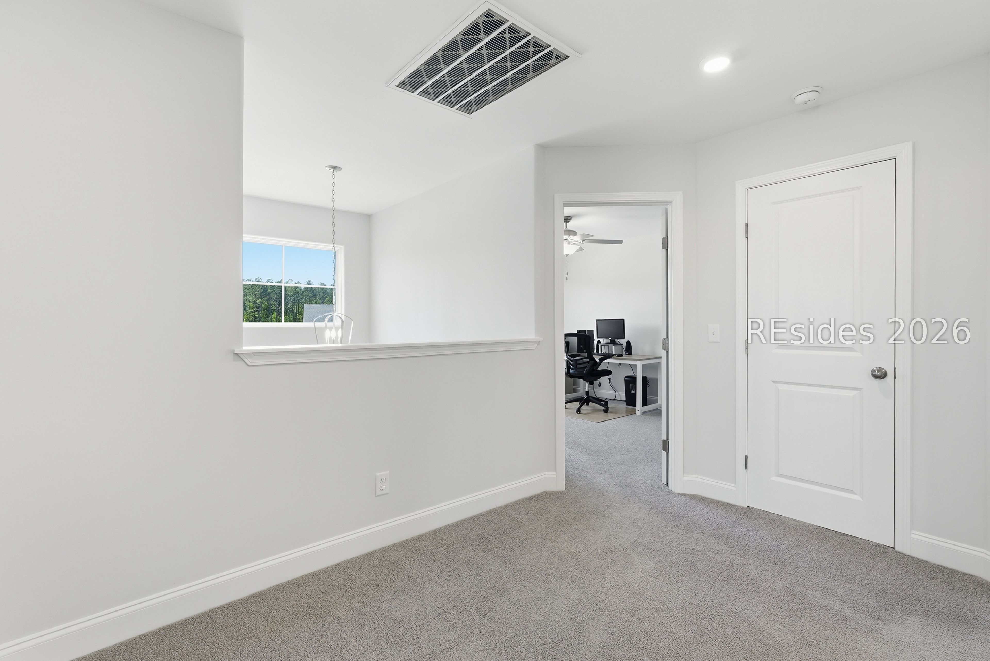 284 Sergeant Jasper Circle Ridgeland, SC 29936 - Photo 33 of 51 Upstairs Hall to Guest Bedroom 1