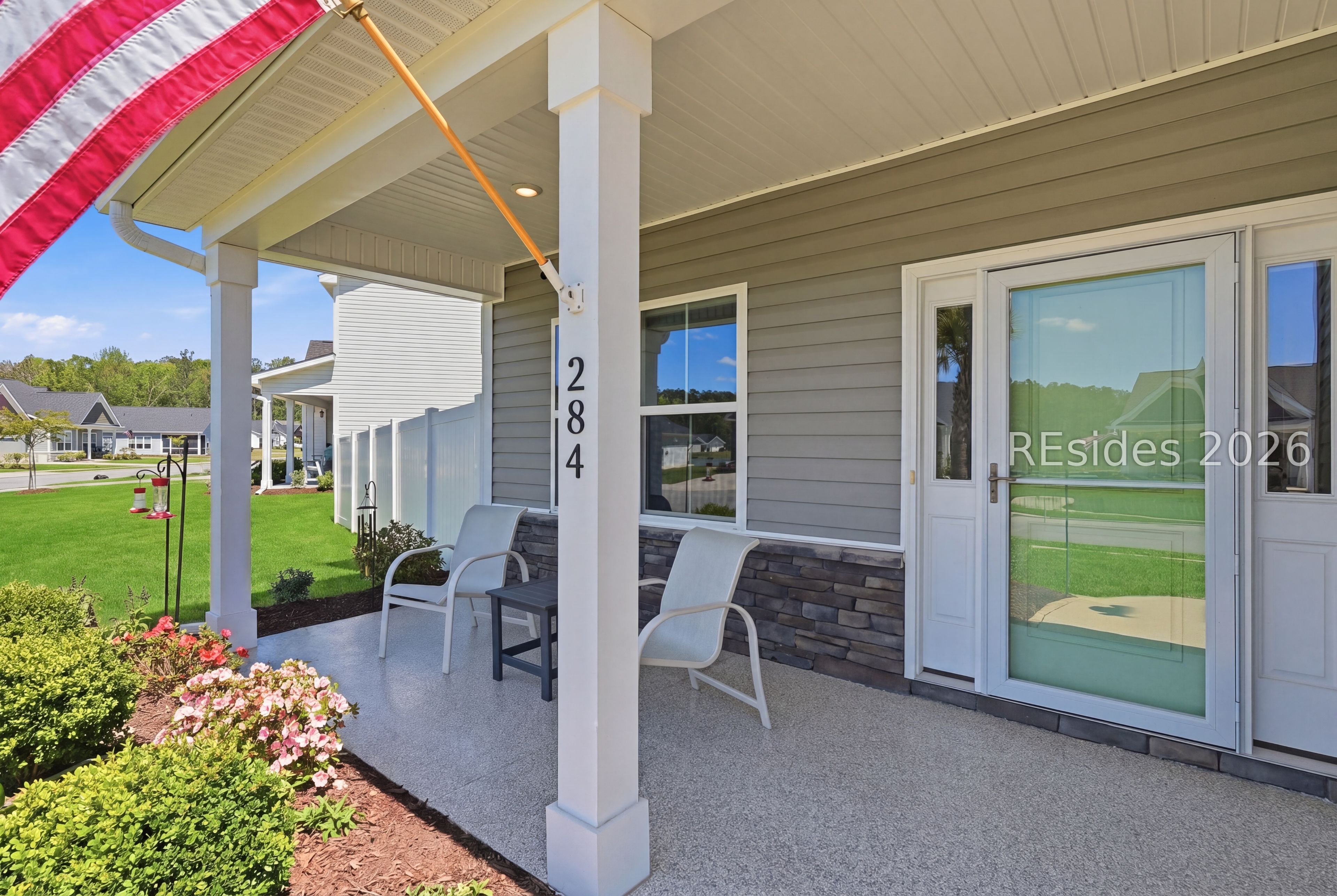 284 Sergeant Jasper Circle Ridgeland, SC 29936 - Photo 4 of 51 Front porch - upgraded epoxy flooring
