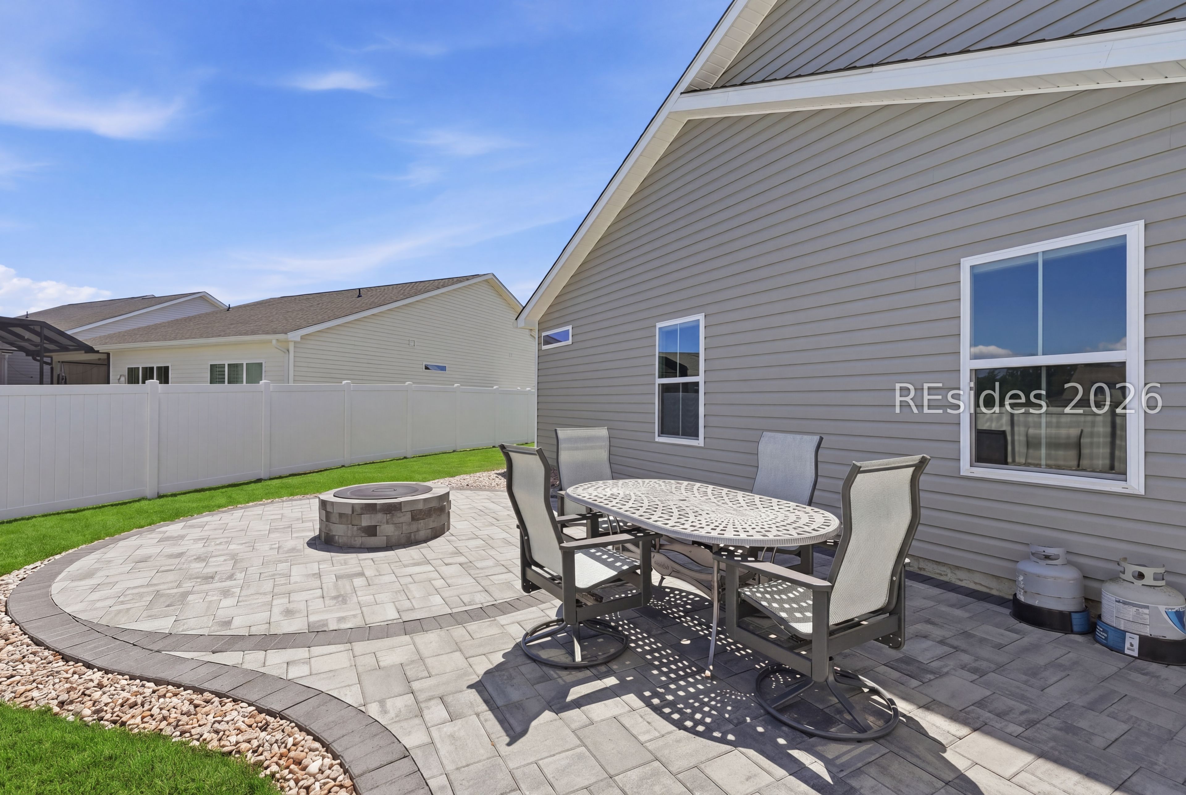 284 Sergeant Jasper Circle Ridgeland, SC 29936 - Photo 44 of 51 Custom Paver Patio with Built-In Fire Pit