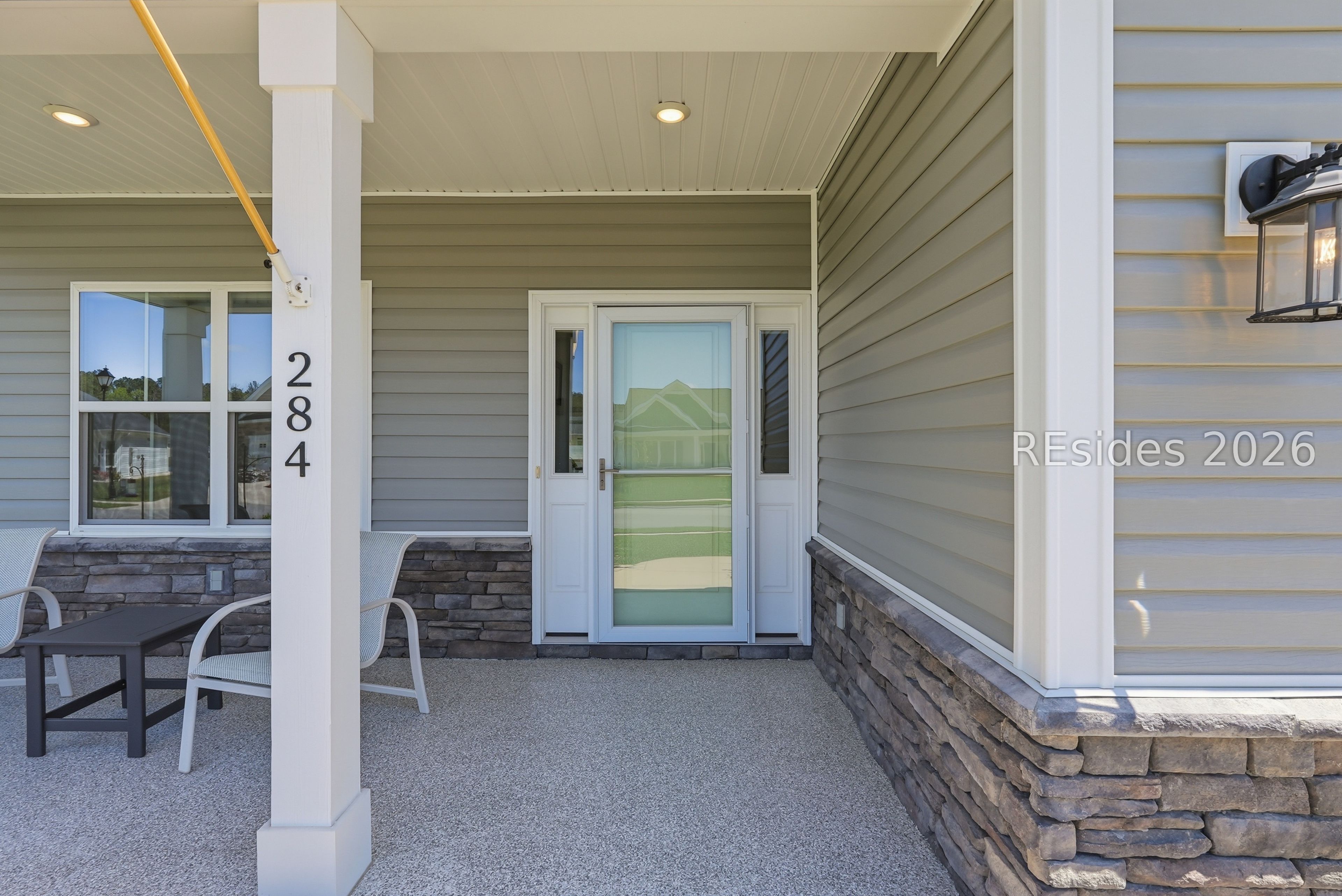 284 Sergeant Jasper Circle Ridgeland, SC 29936 - Photo 5 of 51 Entrance - Upgraded epoxy flooring & stone accent