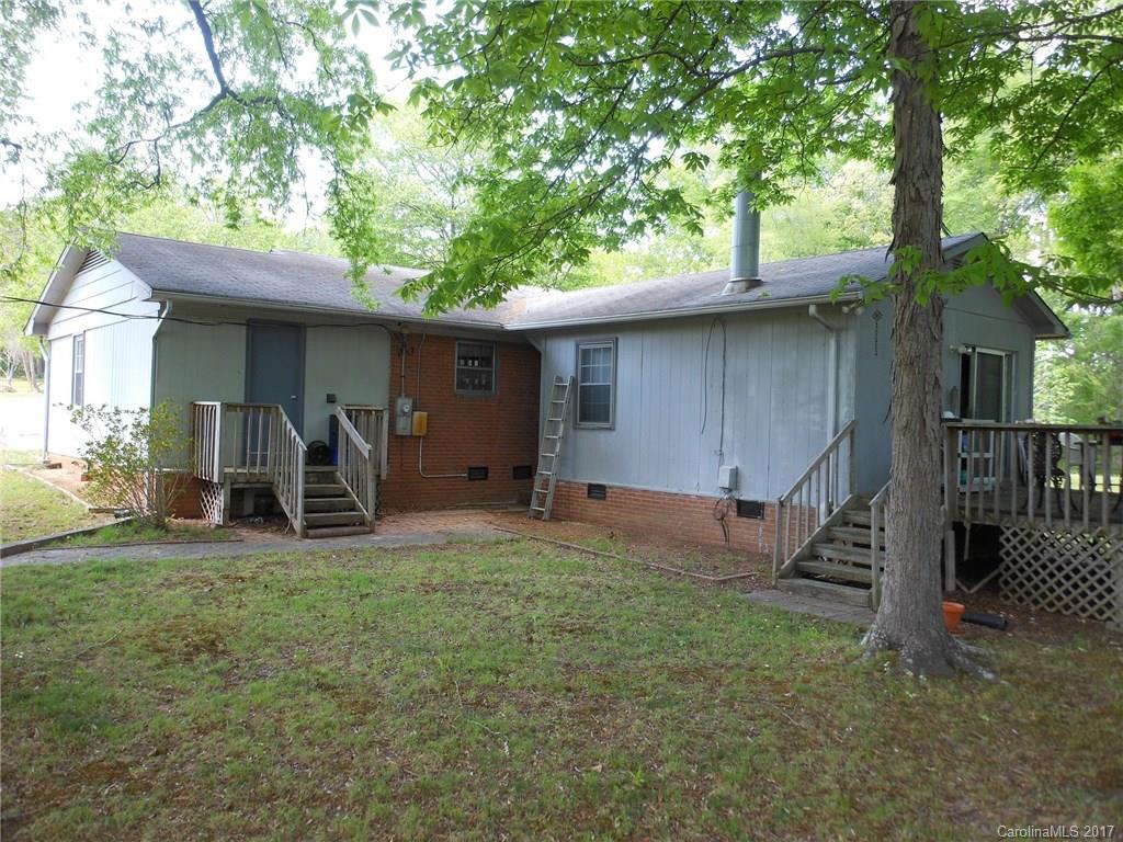 604 Allen Way Indian Trail, NC 28079 - Photo 4 of 4 a view of a house with a yard and a large tree