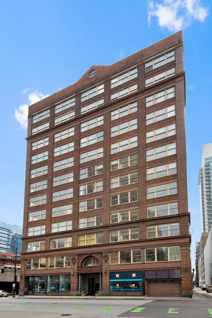 161 West Harrison Street, Unit 802 Chicago, IL 60605 - Photo 1 of 19 a front view of a building with a street