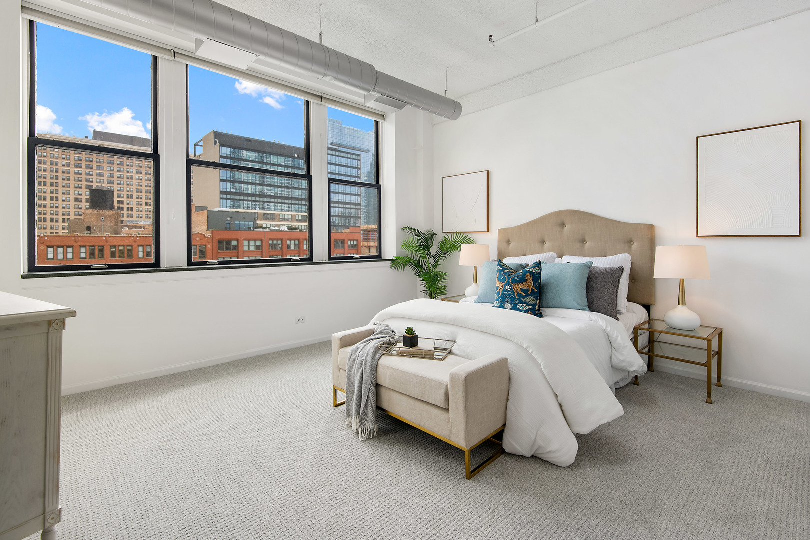 161 West Harrison Street, Unit 802 Chicago, IL 60605 - Photo 12 of 19 a bedroom with a bed and window