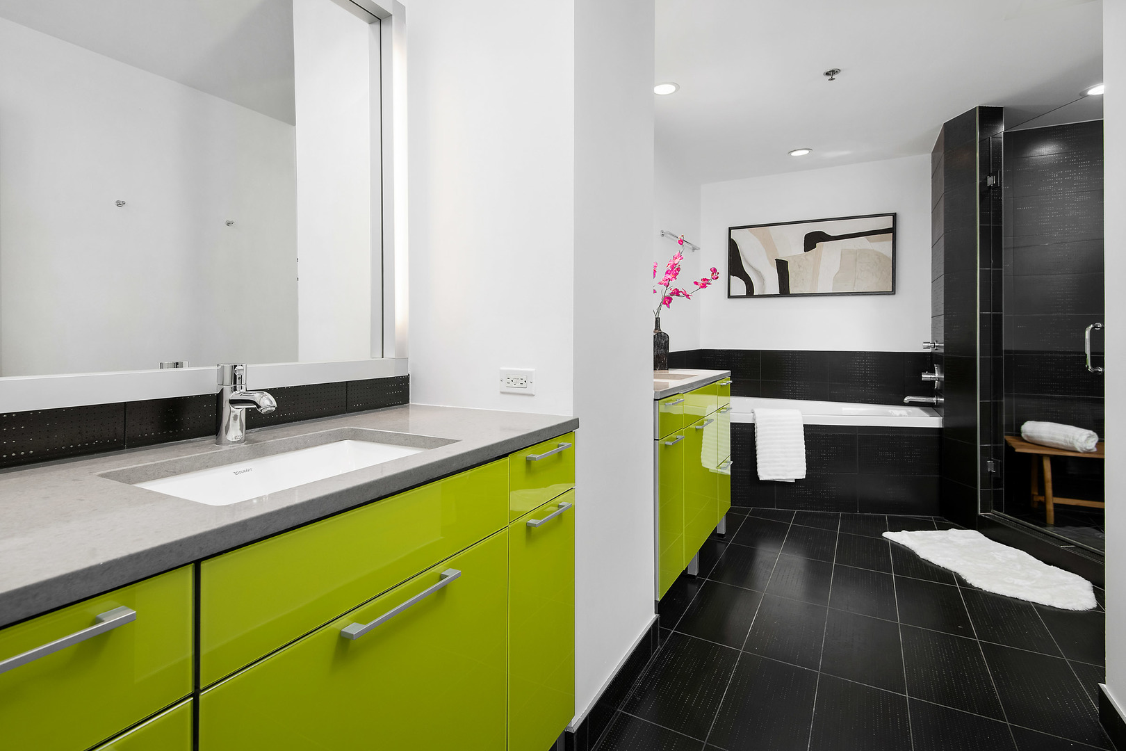161 West Harrison Street, Unit 802 Chicago, IL 60605 - Photo 14 of 19 a bathroom with a sink and a mirror