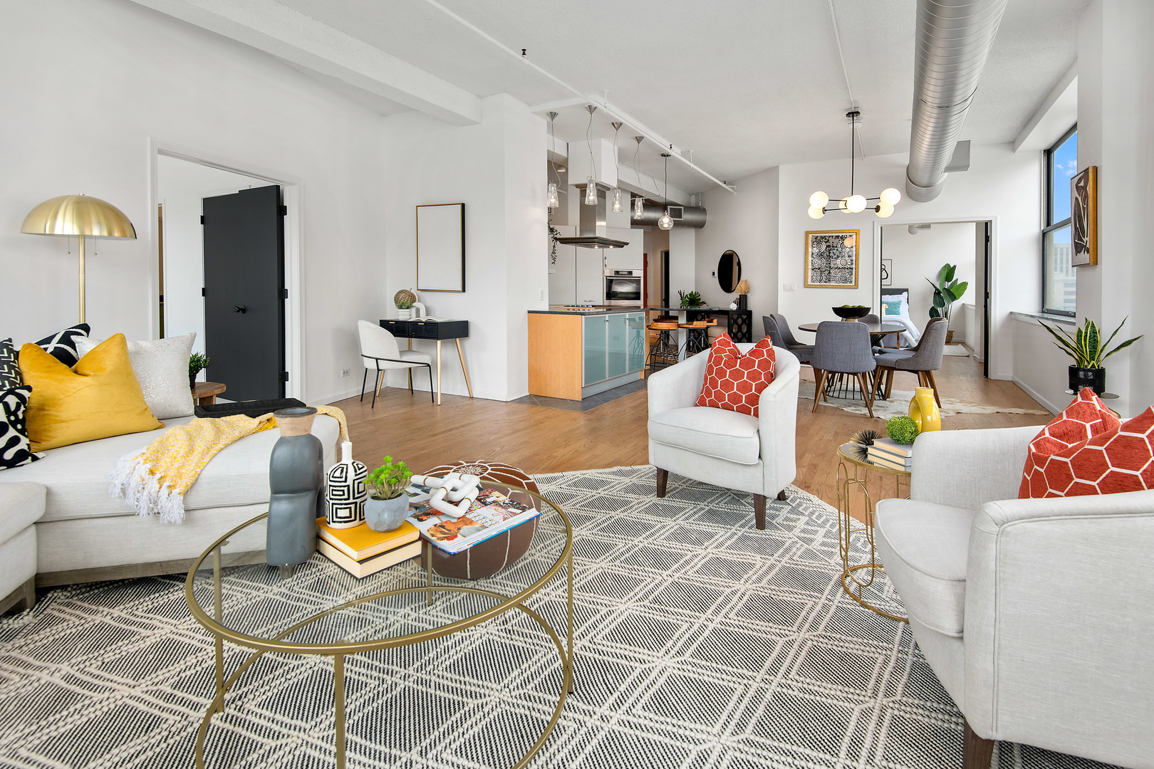 161 West Harrison Street, Unit 802 Chicago, IL 60605 - Photo 7 of 19 a living room with patio furniture and kitchen view