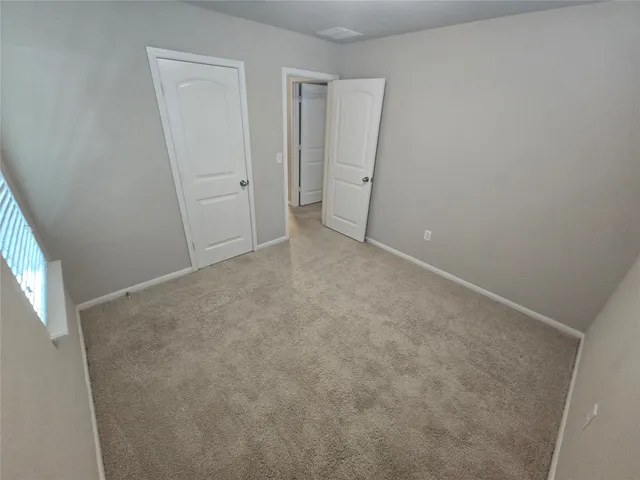 an empty room with closet
