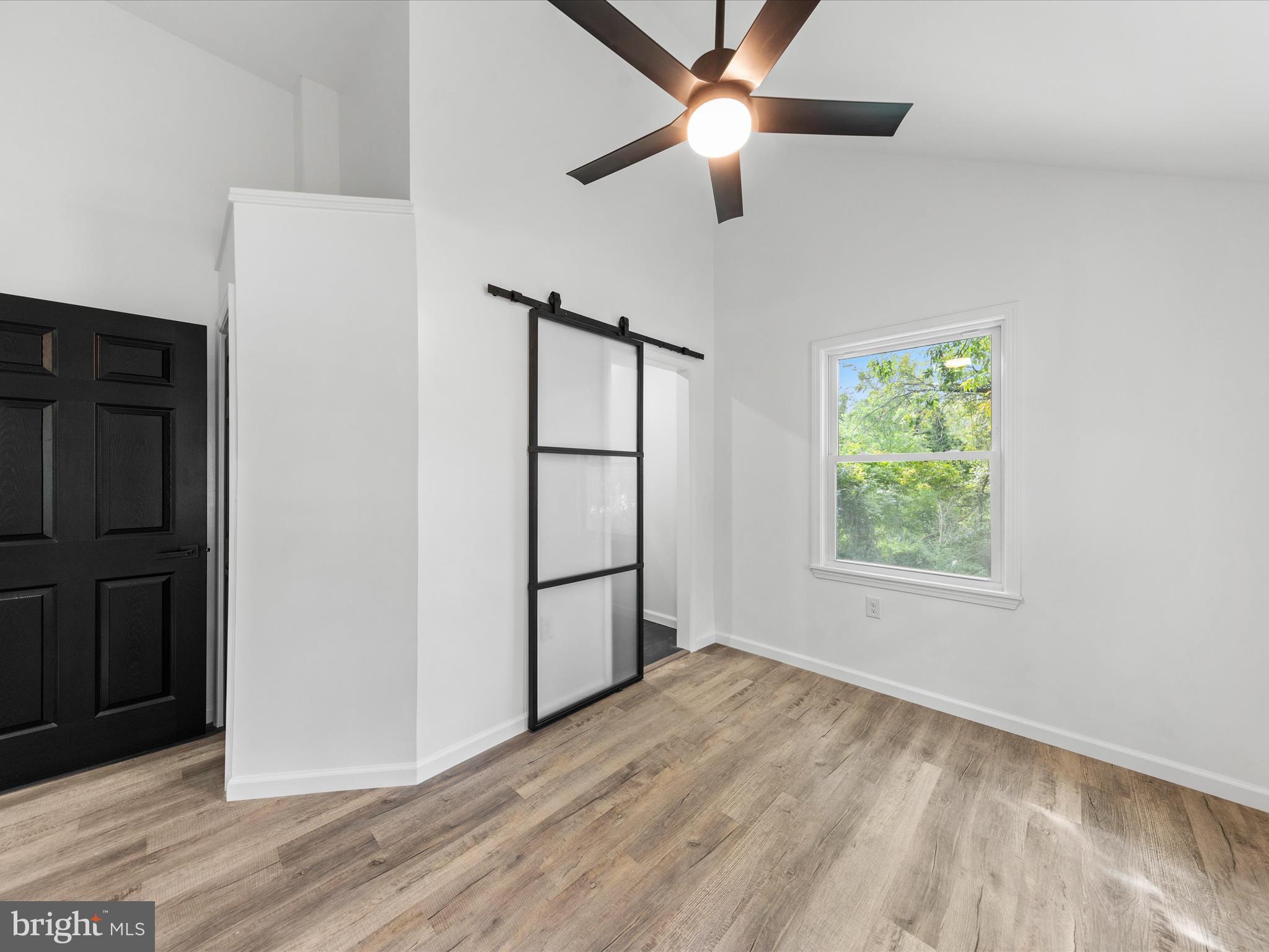 700 Moores Avenue Cambridge, MD 21613 - Photo 18 of 44 View in to bathroom with barnyard style door