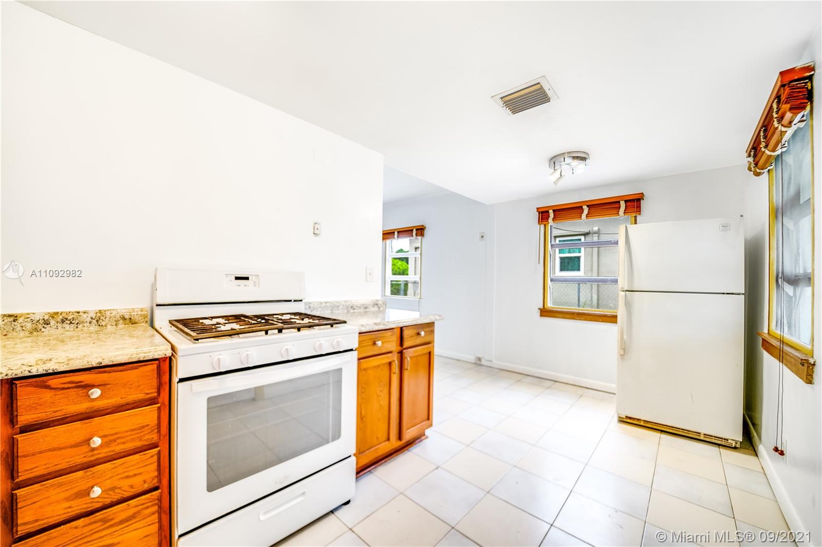 209 Southwest 5th Street Dania Beach, FL 33004 - Photo 12 of 20 a utility room with washer and dryer