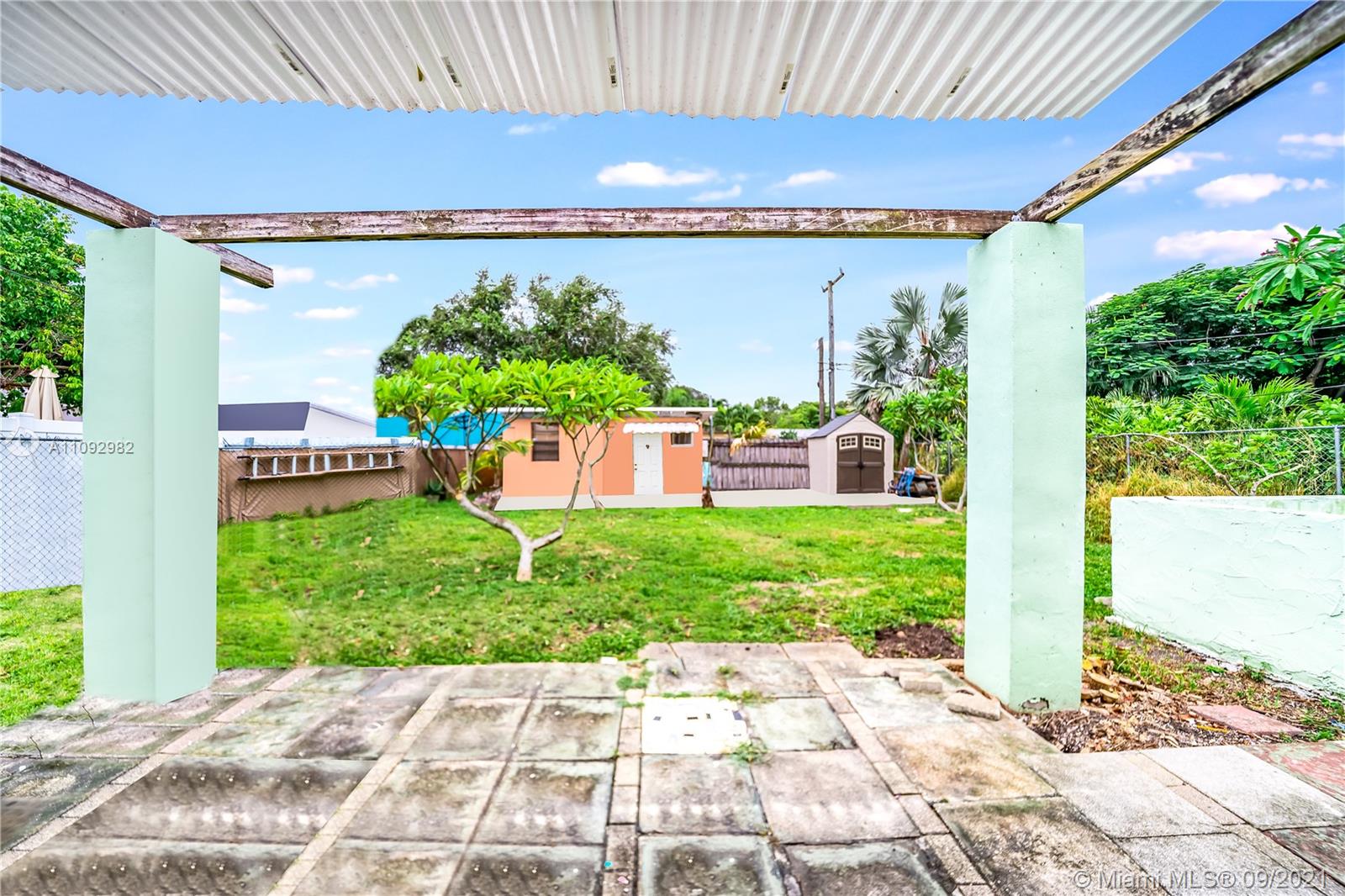 209 Southwest 5th Street Dania Beach, FL 33004 - Photo 3 of 20 a view of a backyard with garden