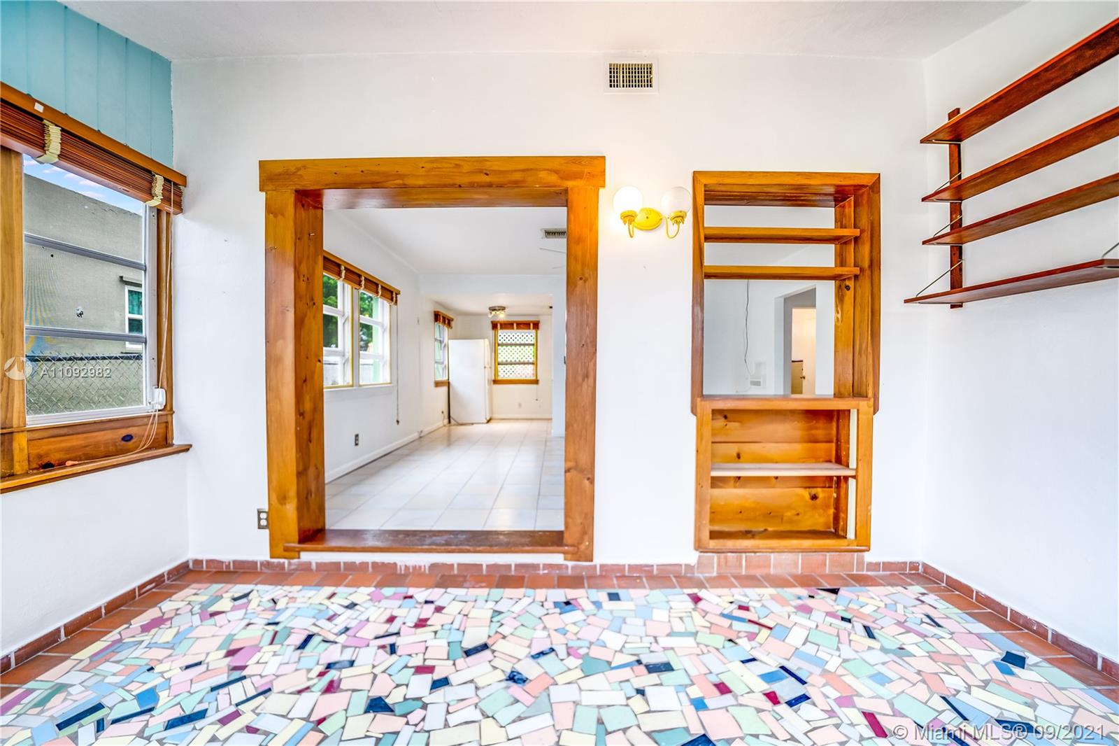 209 Southwest 5th Street Dania Beach, FL 33004 - Photo 10 of 20 a view of an empty room and window