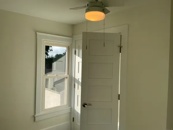 a bathroom with a shower and a sink