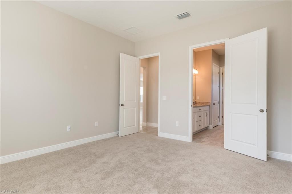 3331 Pilot Circle Naples, FL 34120 - Photo 13 of 28 a view of an empty room