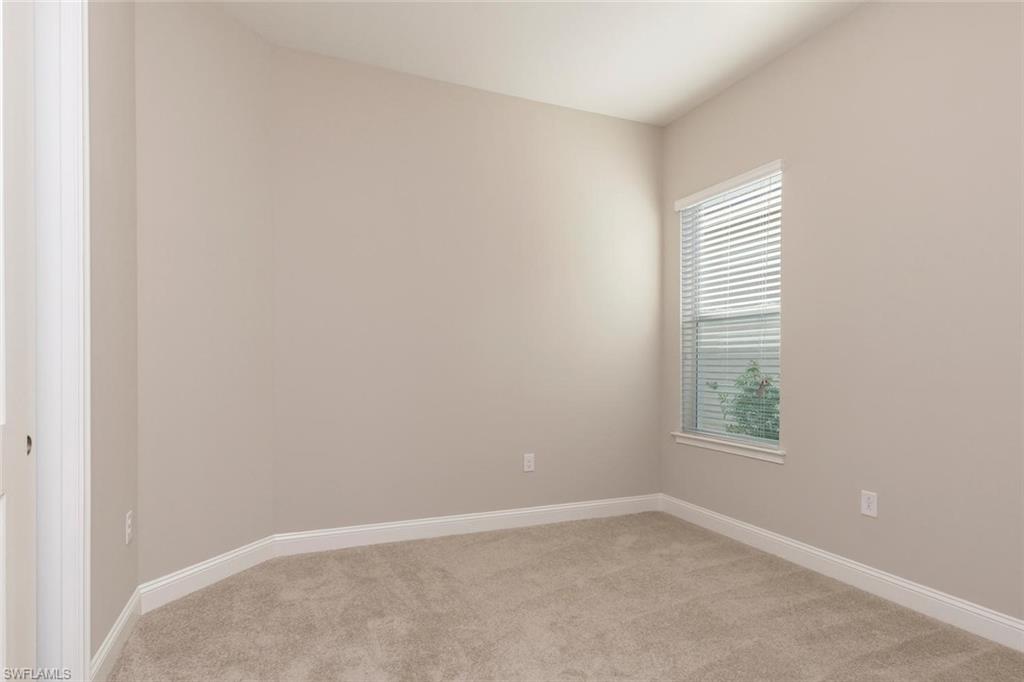 3331 Pilot Circle Naples, FL 34120 - Photo 16 of 28 an empty room with windows