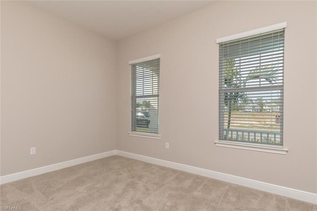 3331 Pilot Circle Naples, FL 34120 - Photo 18 of 28 a view of an empty room with a window