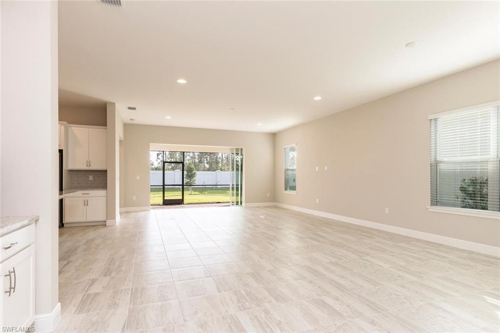 3331 Pilot Circle Naples, FL 34120 - Photo 2 of 28 a view of an empty room with a window