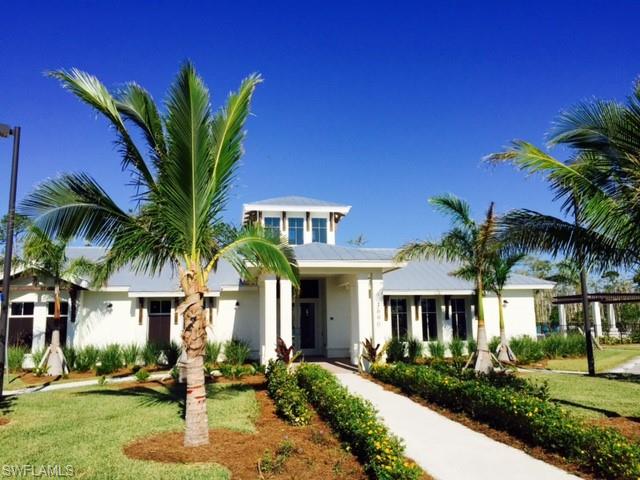 3331 Pilot Circle Naples, FL 34120 - Photo 21 of 28 a front view of house with yard and green space