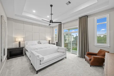 a bed room with a bed and a couch